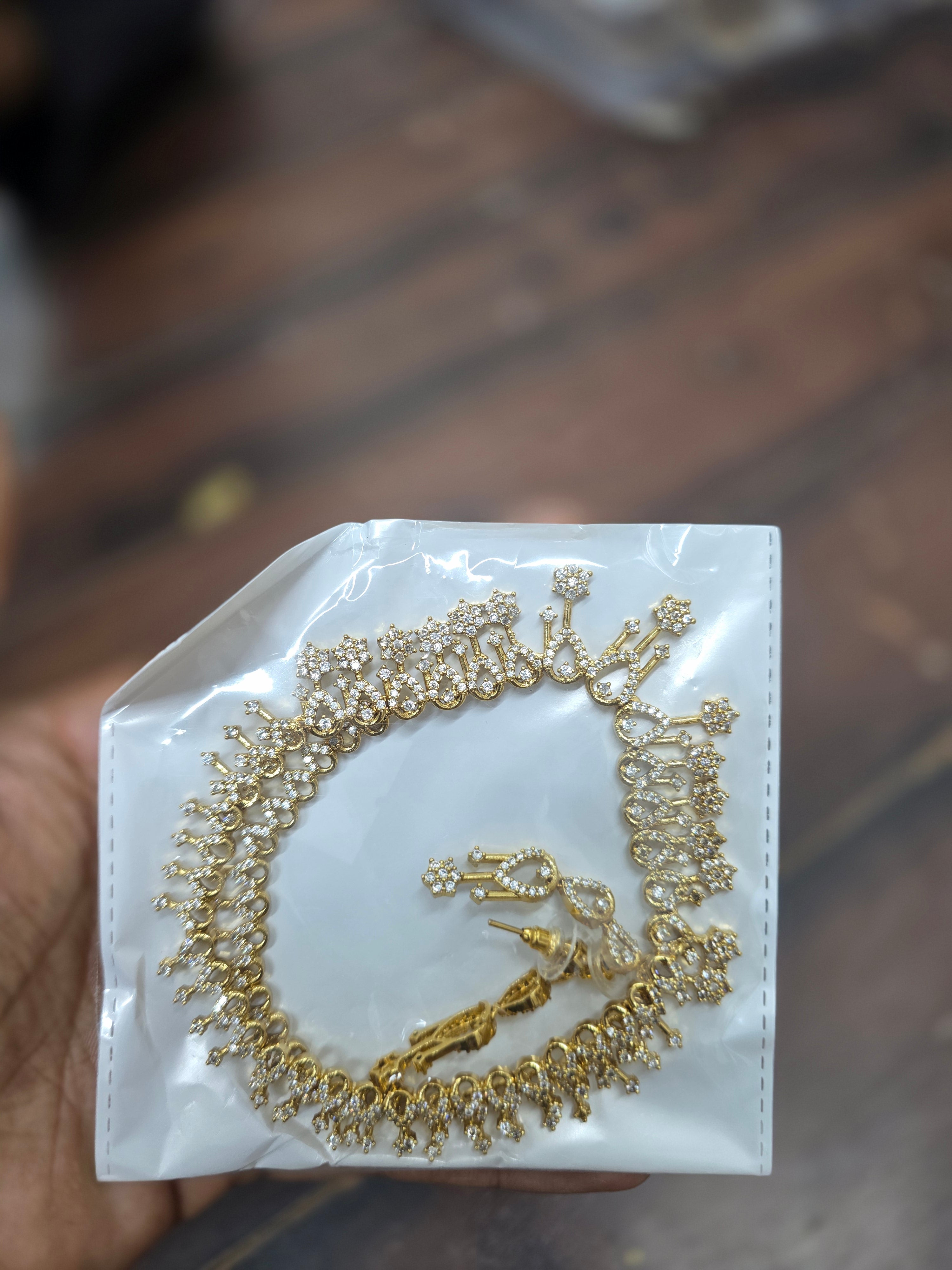 Antique Gold Classic American Diamond Festive Choker with Hanging Star Droplets