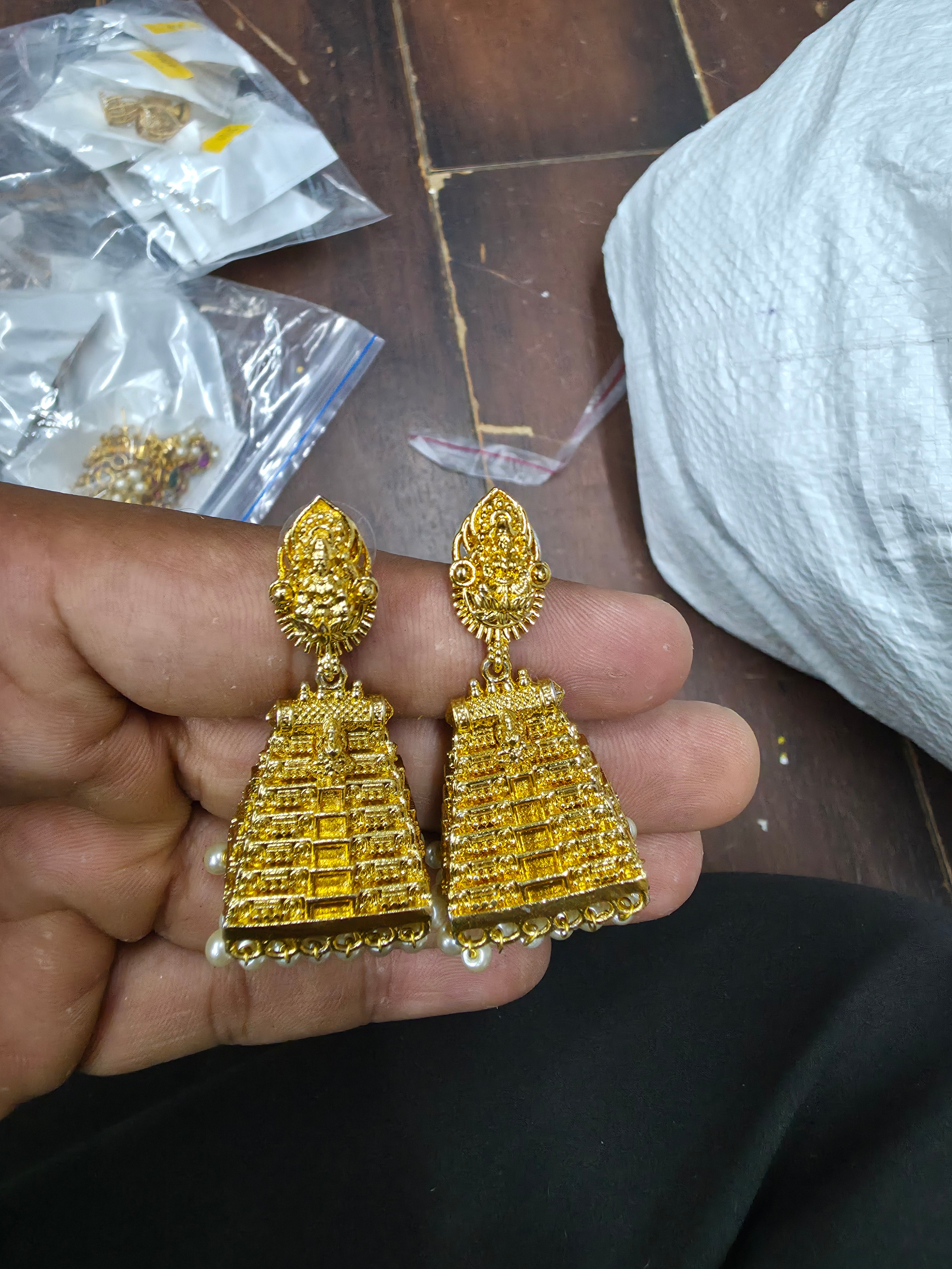 Gold-Plated Lakshmi Temple Gopuram Jhumka Earrings with Pearl Borders
