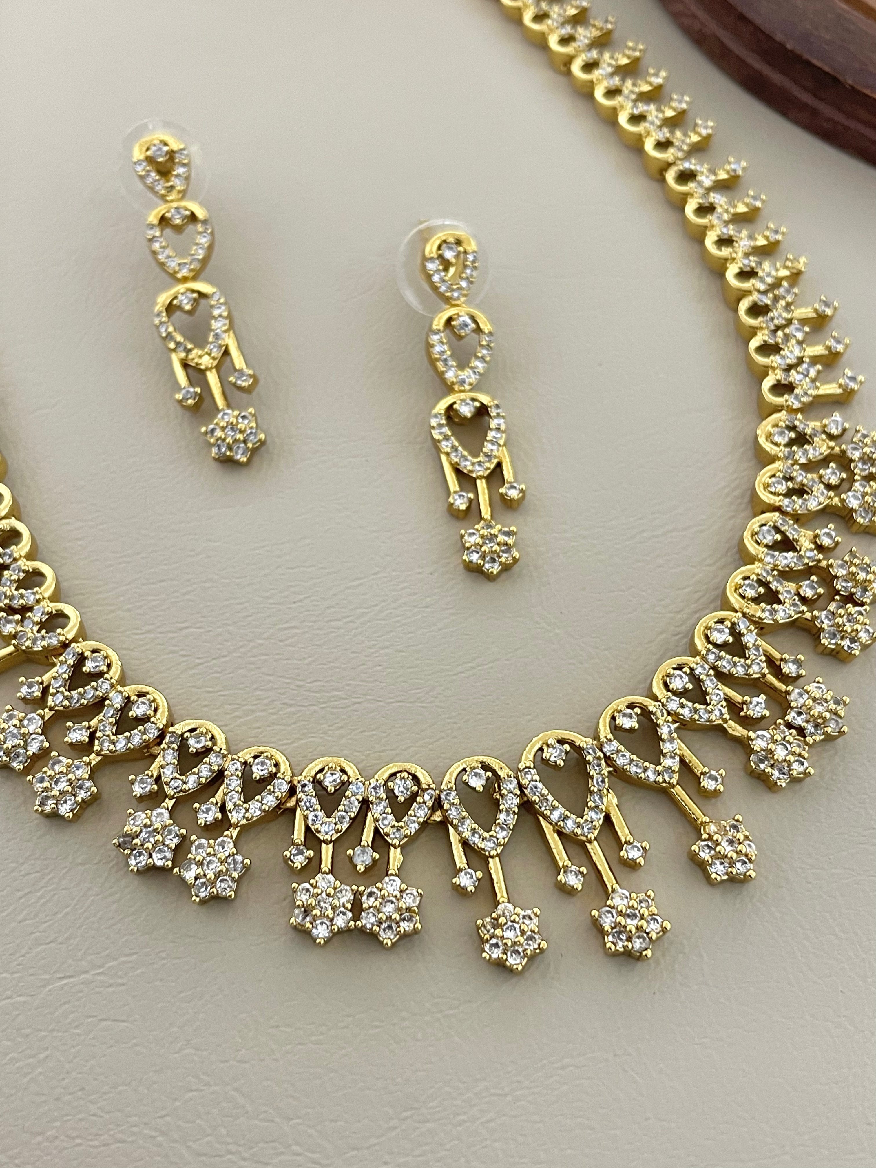 Antique Gold Classic American Diamond Festive Choker with Hanging Star Droplets