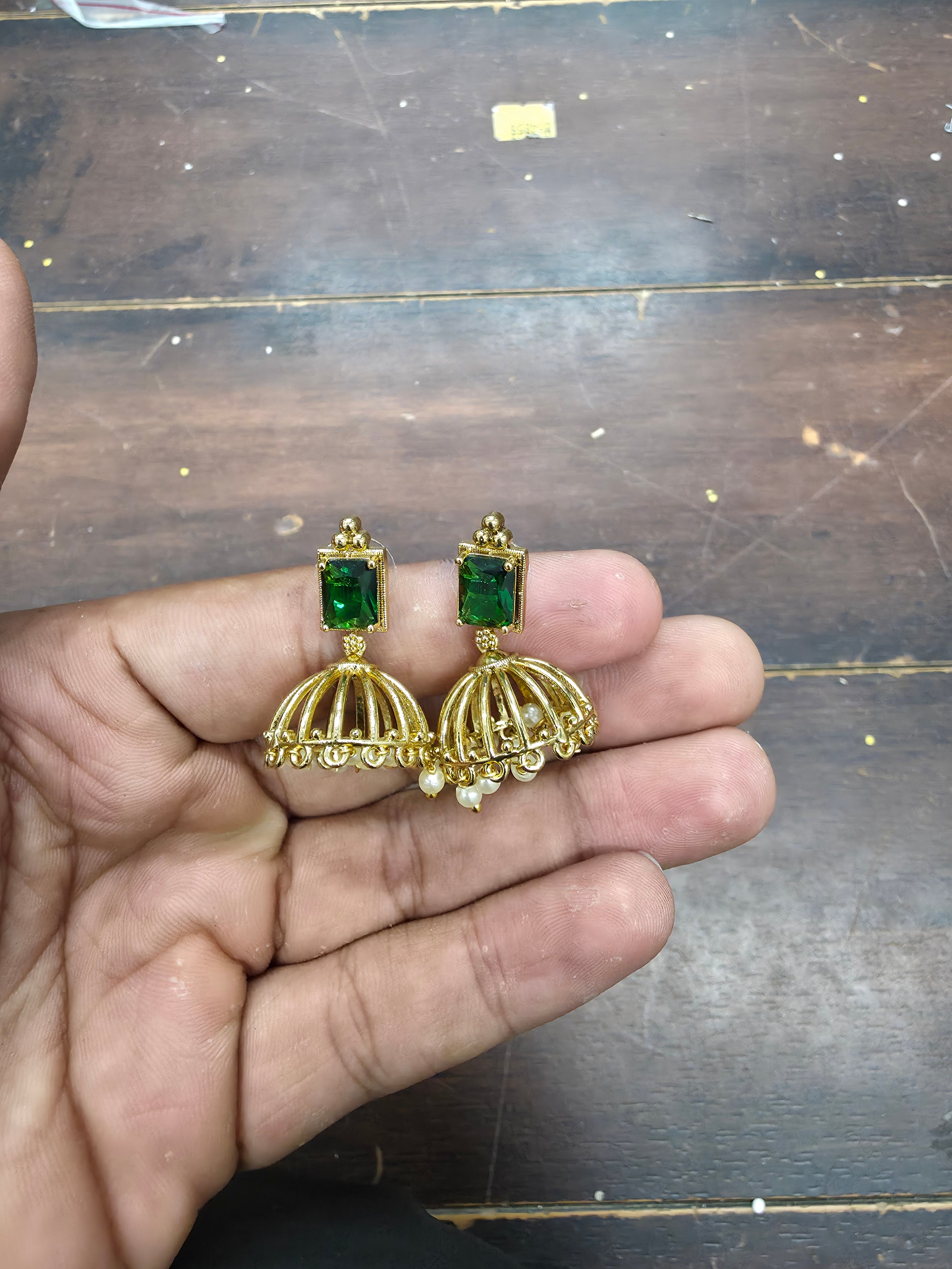 Gold-Plated Emerald Green Stone Jhumka Earrings with Pearl Drops