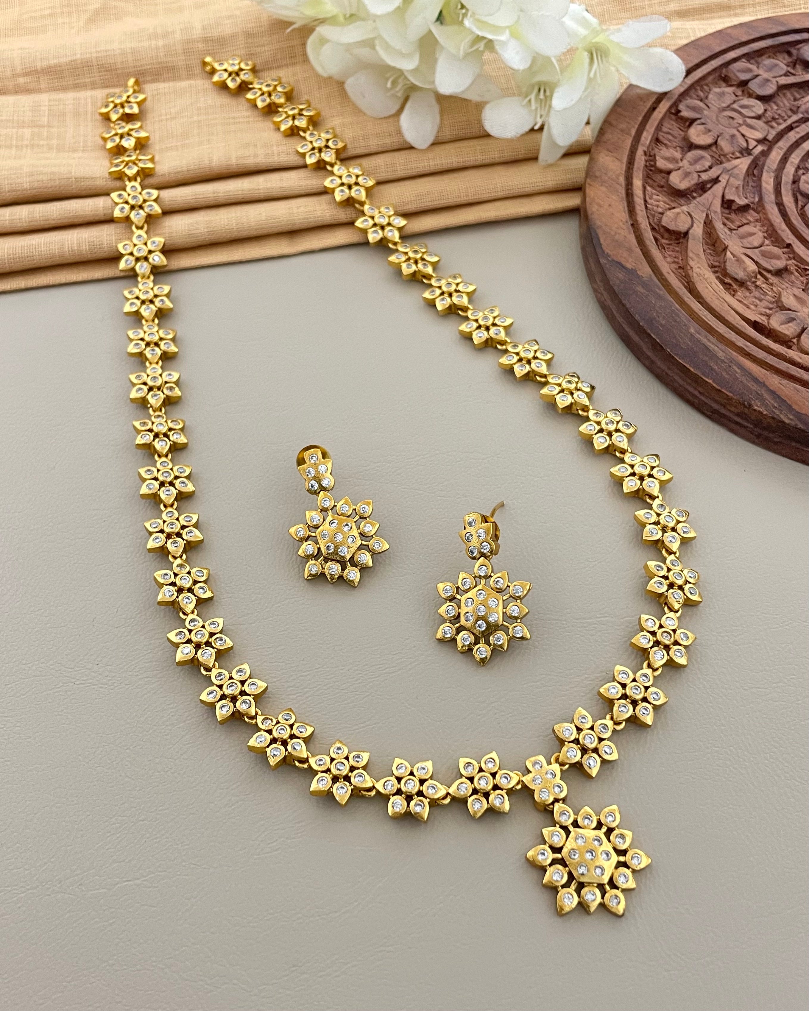 Antique Gold Classic American Diamond Starburst Festive Haram with Matching Earrings